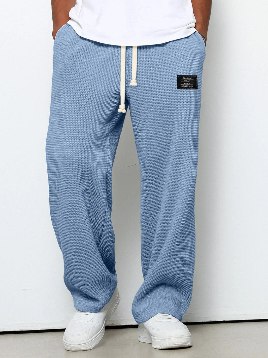 Men's Waffle-Textured Drawstring Trousers with Side Pockets and Wide Legs for Casual Wear - Image 2