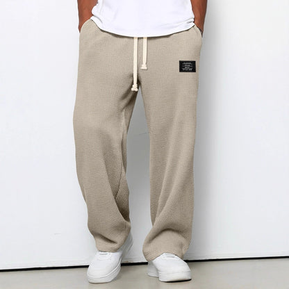 Men's Waffle-Textured Drawstring Trousers with Side Pockets and Wide Legs for Casual Wear - Image 4