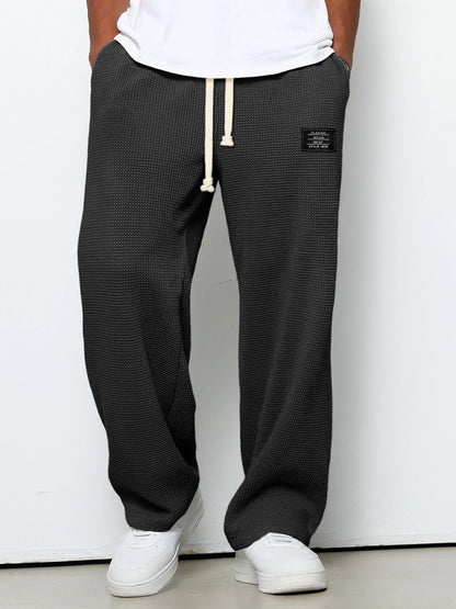 Men's Waffle-Textured Drawstring Trousers with Side Pockets and Wide Legs for Casual Wear - Image 6