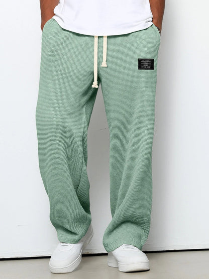 Men's Waffle-Textured Drawstring Trousers with Side Pockets and Wide Legs for Casual Wear - Image 7